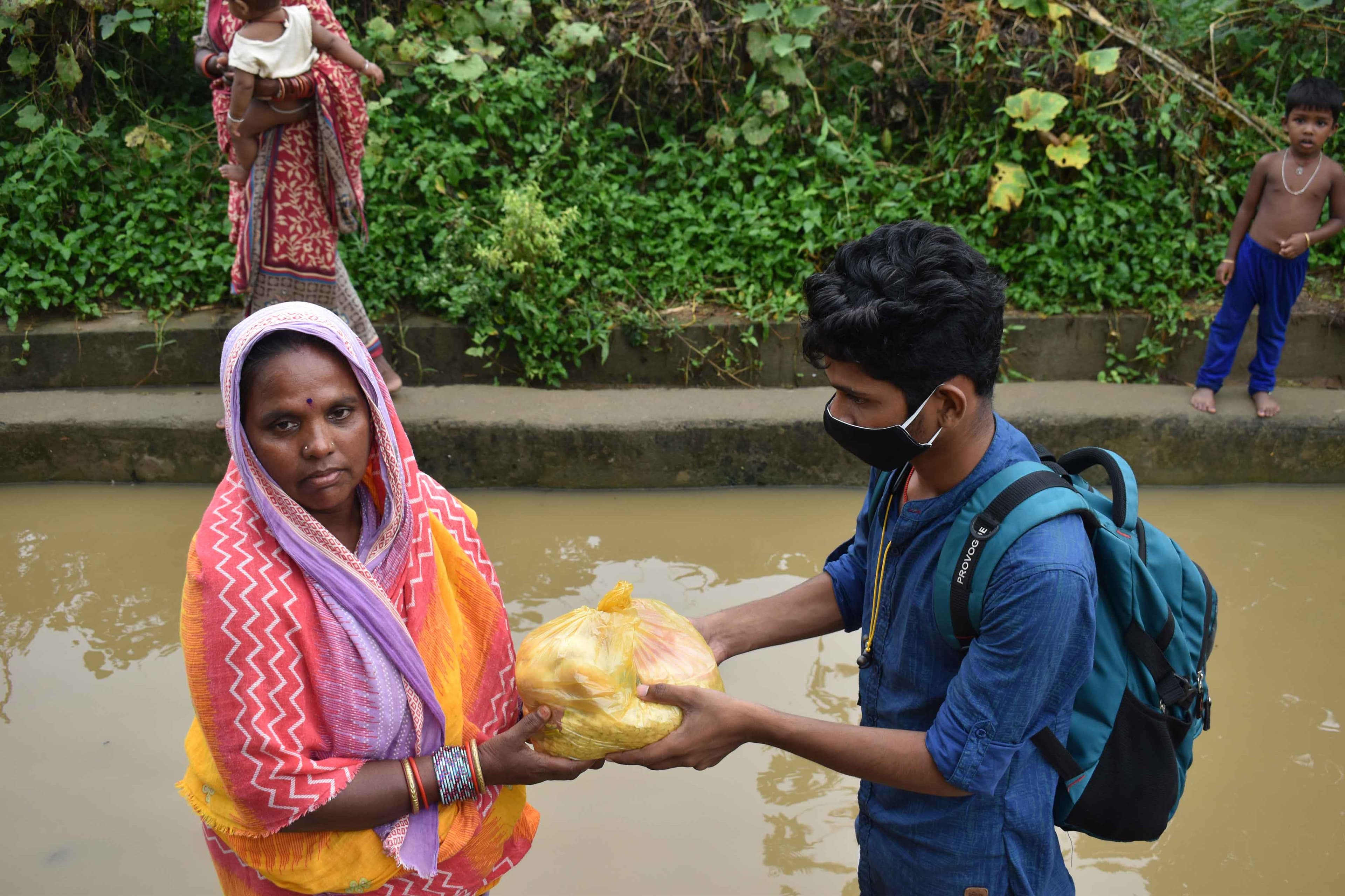 Volunteers distributing emergency relief kits