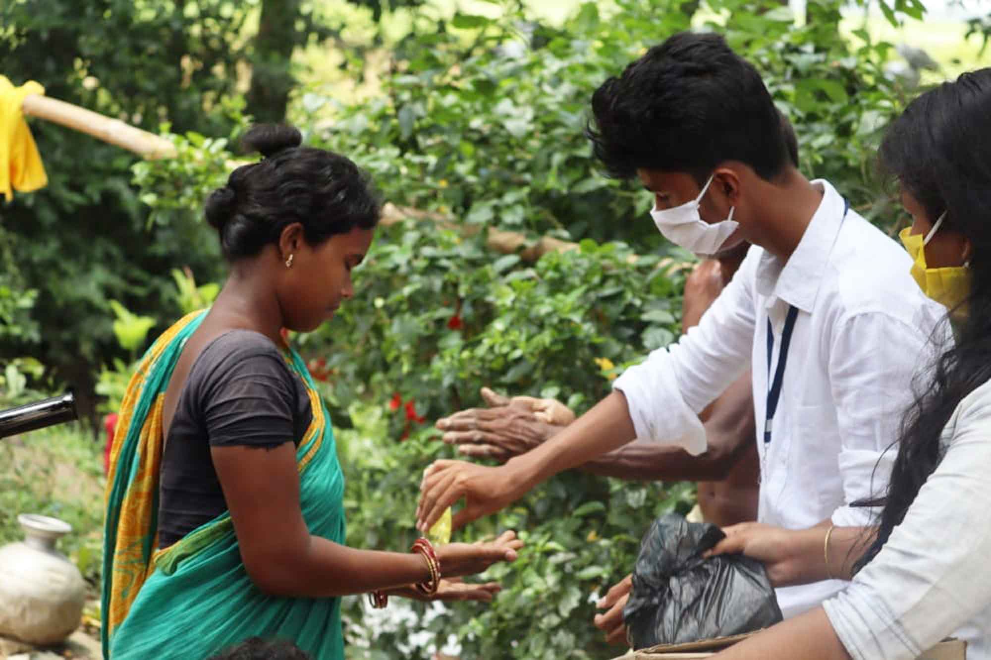 Sanyukt volunteers distributing relief supplies during the COVID-19 response